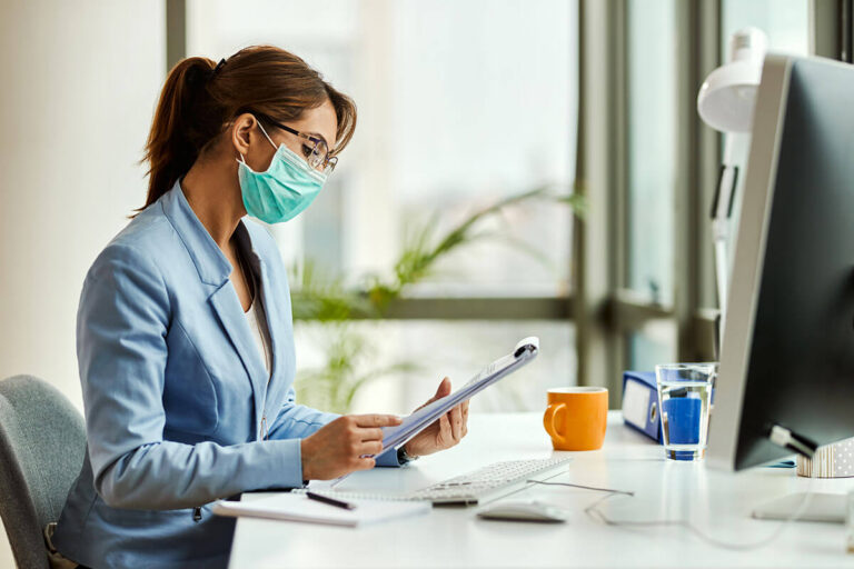 Physician reviewing medical records for litigation support