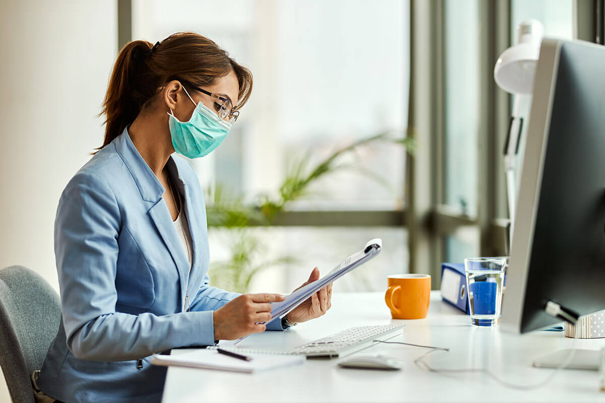 Physician reviewing medical records for litigation support